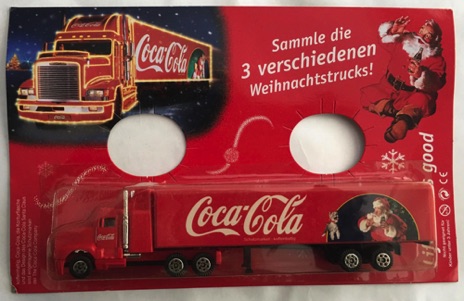 01016-1 € 6,00 coca cola vrachtwagen kerstman met hond.jpeg